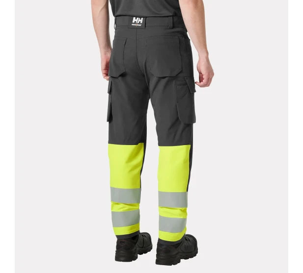 IKH HH ALNA 4X CARGO Joustavat tyohousut reisitaskuilla Huomiovarina Hi Vis keltainen Tuotekoodi HH77433 369 koko Saarenpaa Oy Kuva 2 kuva